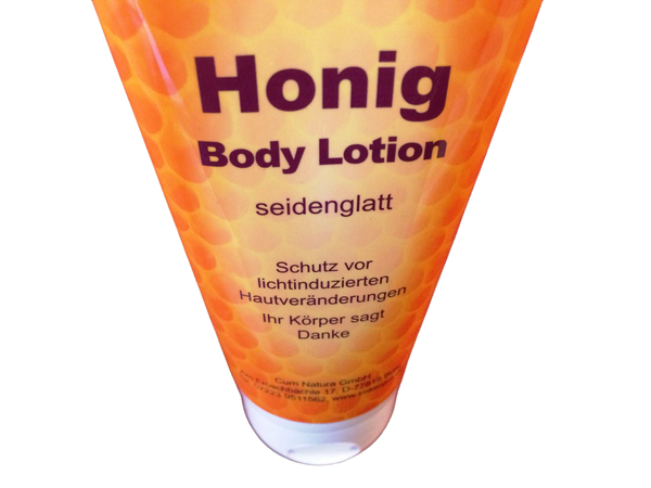 Body lotion with honey and beeswax